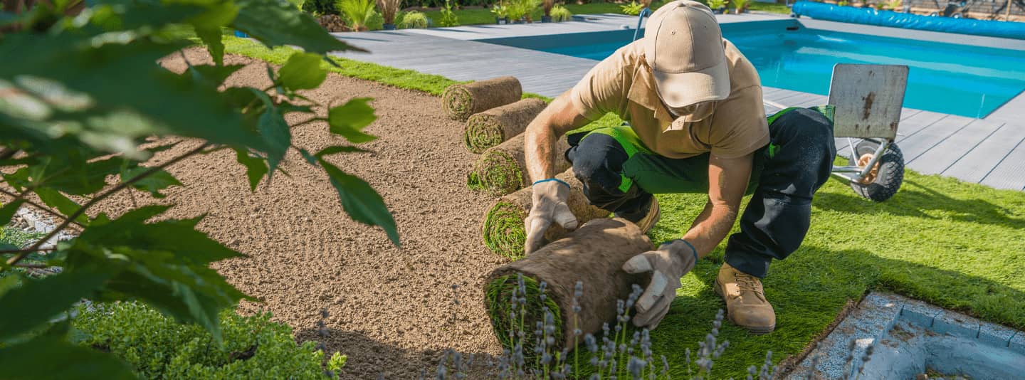 Landscaping crew at work on a garden site — Ascora helps schedule crews, manage jobs and get paid faster.